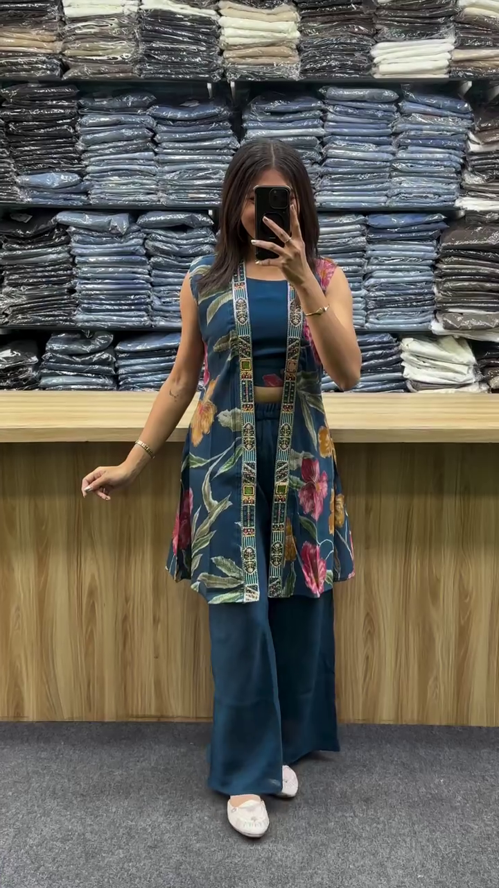 Bring dreamy elegance to your wardrobe with this Lavender Sheer Floral Embroidered Organza Button-Down Shirt layered over a Smocked Inner Tube Top paired with Cream